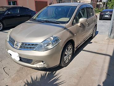 e39 rul: Nissan Tiida hatchback - Kuzov: 5 qapılı hatchback, qızılı/şampan — 3