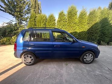 Транспорт: Mazda Demio: 2002 г., 1.5 л, Автомат, Бензин, Хэтчбэк — 1