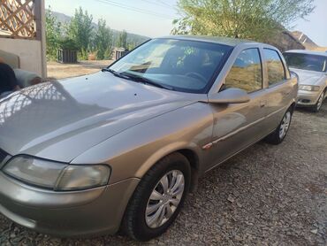 диски на опель зафира а: Седан Opel Vectra в бежевом или золотистом цвете. Автомобиль имеет