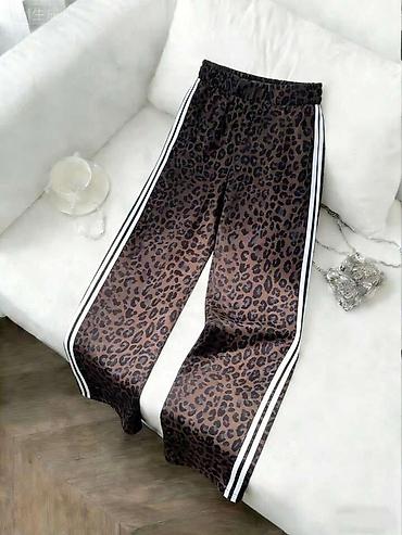 Pantalone: Ženske široke pantalone sa leopard printom - Kroj: široke nogavice — 7