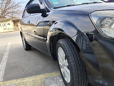 Kia: Kia Rio: 1.4 l | 2010 il Sedan — 13