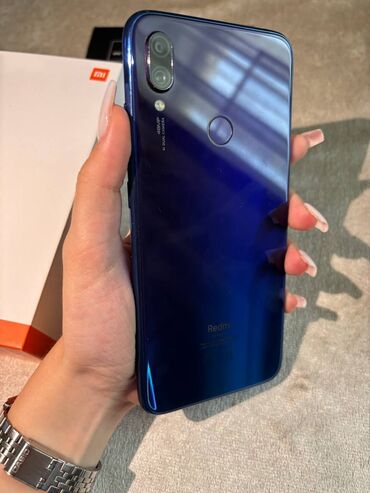 kiçik telefon: Xiaomi Redmi Note 7, 64 GB, rəng - Bənövşəyi, 
 İki sim kartlı, Barmaq izi, Face ID