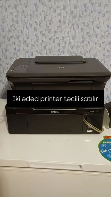 İki printer bir yerdə. 1) HP çoxfunksiyalı cihaz - Üst paneldə