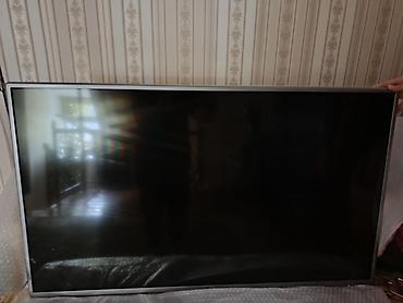 Телевизоры: Телевизор LG, плоская панель с тонкой серебристой рамкой. Диагональ — 3