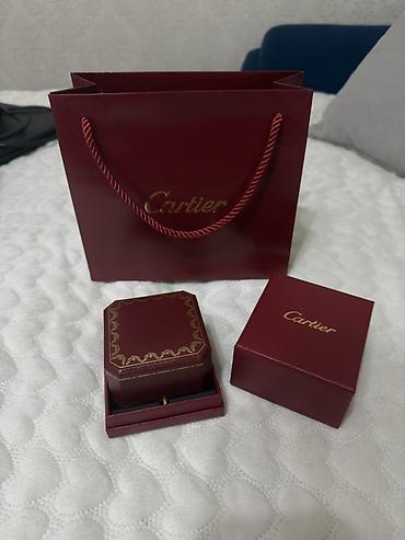 золото картье: Подарочный комплект Cartier: фирменный бумажный пакет бордового цвета — 1