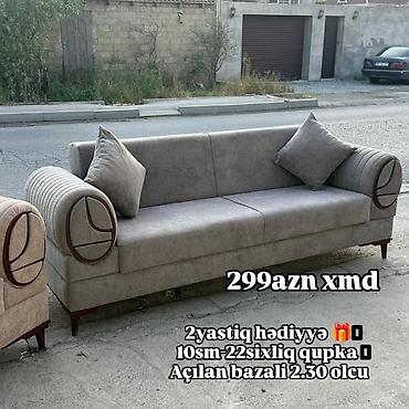 ucuz əşyalar: Açılan bazalı divan – 2.30 m ölçü. - Rəng: boz tonlarda. - Yumru qol — 1