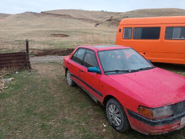 кооператив авто: Mazda 323: 1990 г., 1.6 л, Механика, Бензин, Седан