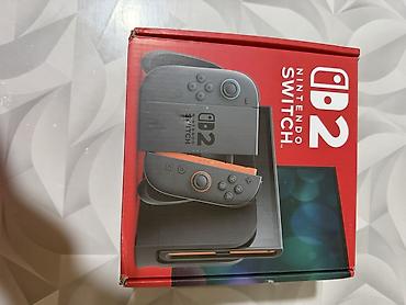 Nintendo Switch: Nintendo Switch (модель с неоновыми Joy‑Con) Игровая консоль-гибрид — 1