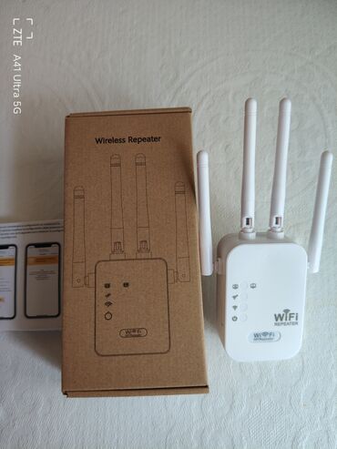 wifi qiymetleri: Wifi repeater .wifi mesafesini artirmaq uçundur.evde hara wifi