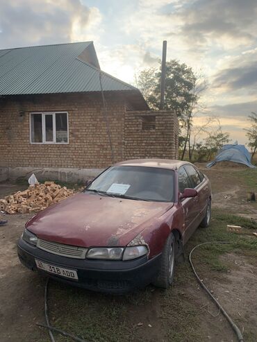 машина алып беребиз: Mazda Cronos: 1991 г., 2 л, Механика, Бензин, Седан