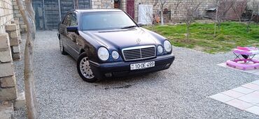 Mercedes-Benz E 240: 2.4 l | 1997 il Sedan
