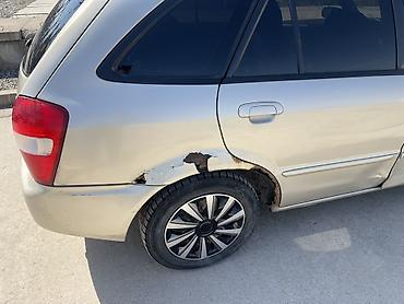 ротационная борона: Mazda 323: 2001 г., 1.6 л, Механика, Бензин, Универсал — 4