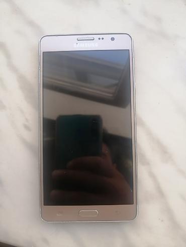 telefon ucun flash kart: Samsung Galaxy On7, 8 GB, rəng - Qızılı, İki sim kartlı — 2