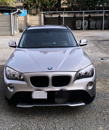 q 7: BMW X1: 2011 г., 2 л, Автомат, Бензин, Кроссовер