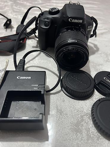 Фотоаппараттар: Зеркальная камера Canon EOS 4000D с комплектным объективом Canon EF-S — 1