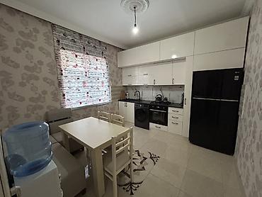 Daşınmaz əmlak: 4 otaqlı, 130 kv. m, Orta təmir — 1