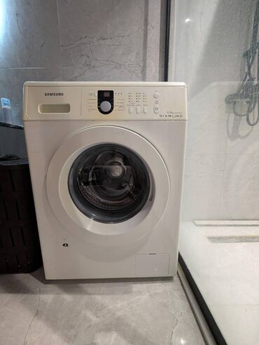 samsung adapteri: Paltaryuyan Samsung. 6kq. Tam işlək vəziyyətdədir