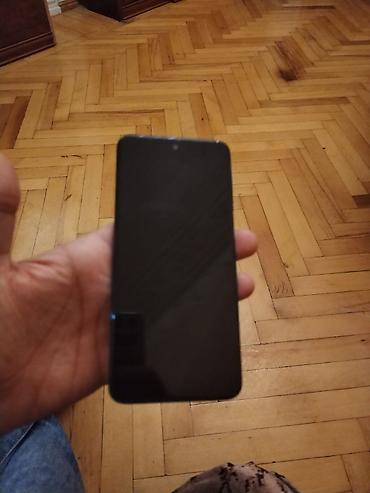xiaomi mi a3: Redmi smartfon Tam ekran dizayna malik, ön hissədə mərkəzdə damcı — 2