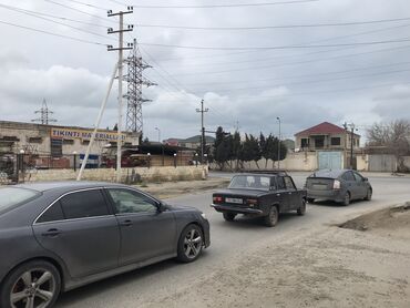 Binalar: Sumqayıt şəhərində 900 kv.m sahəsi olan və 1hektar torpaq sahəsinüə — 21