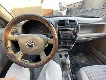 mazda demio 2007: Mazda Demio: 2001 г., 1.5 л, Механика, Бензин, Хэтчбэк — 6