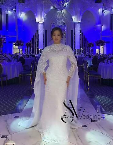 алтын така: Свадебное платье Suranchieva Wedding Home - Эффектное белое платье — 1