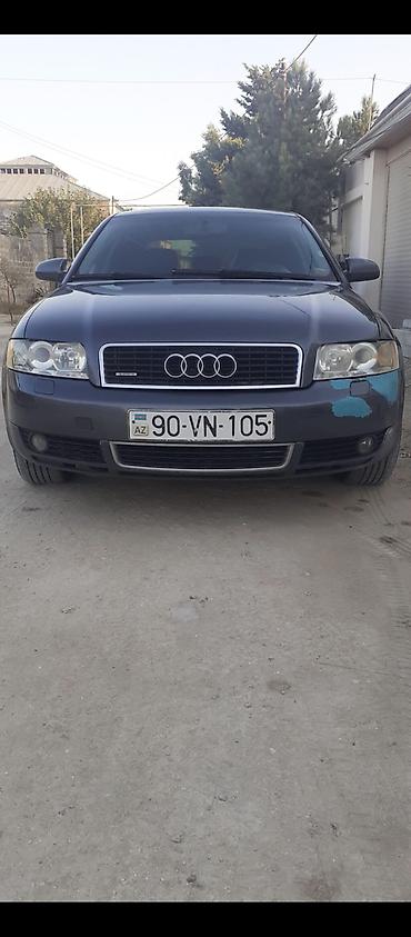 bmw e 38: Audi A4 sedan – tünd boz rəng, 4 qapı, 5 yerlik. B6 kuzov dizaynı — 2