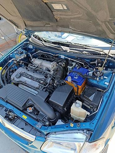 mazda авто: Mazda 323: 1999 г., 1.5 л, Автомат, Бензин, Универсал — 5
