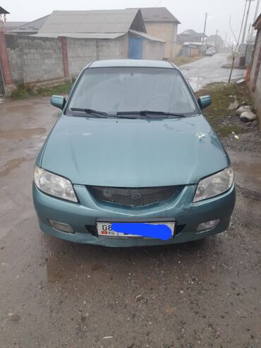 Mazda: Mazda 323: 2002 г., 1.6 л, Механика, Бензин, Седан