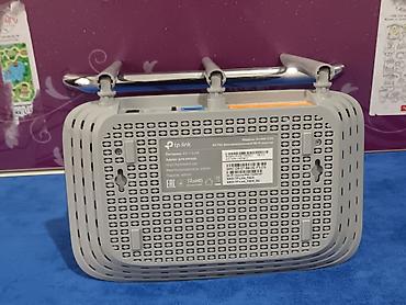 Модемы и сетевое оборудование: Wi‑Fi роутер TP‑Link (серия Archer/серый низ, глянцевая чёрная крышка — 8