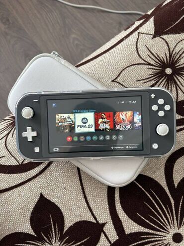 PS5 (Sony PlayStation 5): Nintendo switch lite. Hec bir problemi yoxdu. Veziyyeti eladi. En son