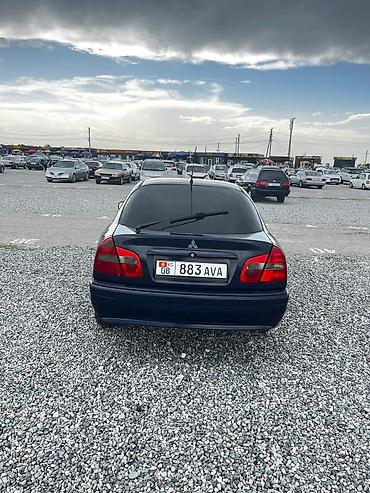 мицубицу каризма: Mitsubishi Carisma: 1999 г., Седан — 1