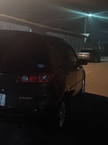 Mazda: Mazda Demio: 2005 г., 1.3 л, Автомат, Бензин, Седан — 7