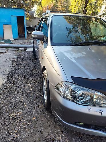 гузку: Honda Odyssey: 2000 г., 2.3 л, Автомат, Бензин, Универсал — 1