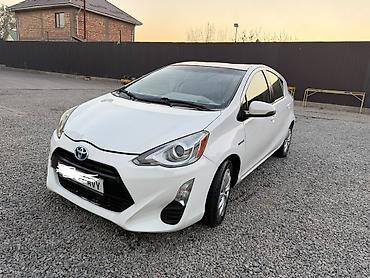 prius: Toyota Prius C: 2016 г., 1.5 л, Гибрид, Хэтчбэк — 1