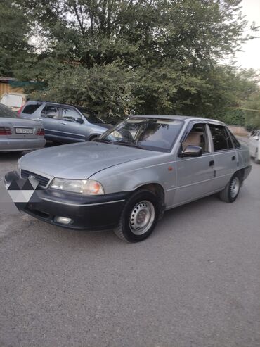 корейские машины на расрочку: Представляем седан Daewoo Nexia серебристого цвета, классический