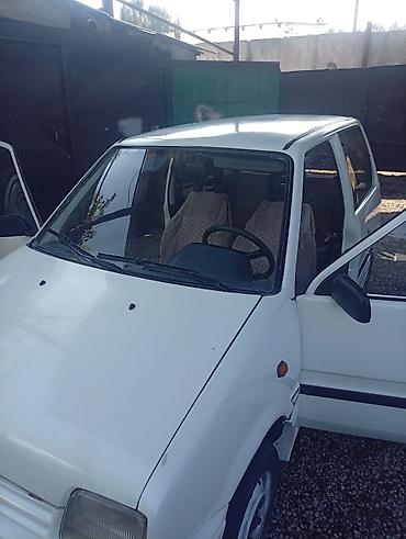 иж урал: Daihatsu Cuore: 1988 г., 0.8 л, Механика, Бензин, Купе — 6