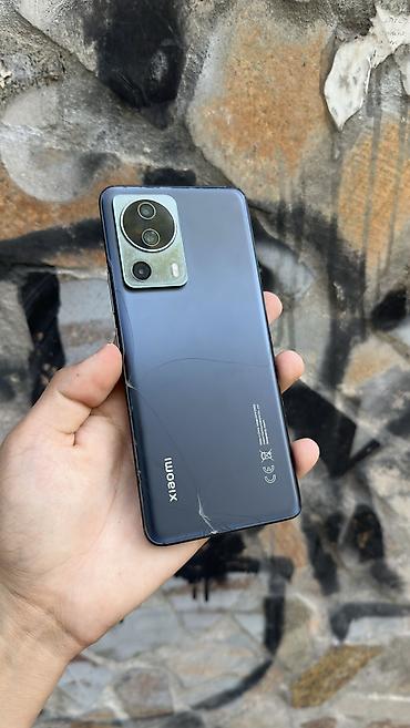 Мобильные телефоны и аксессуары: Xiaomi, 13 Lite, Б/у, 256 ГБ, цвет - Черный, 1 SIM, 2 SIM, eSIM — 1