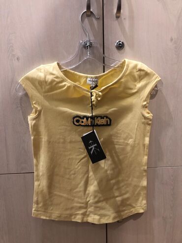 Futbolka və maykalar: Calvin Klein yenixs razmere gedir və 12 yaşa
