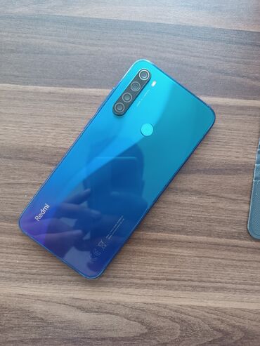 телефон fly ff179: Xiaomi Redmi Note 8, 64 ГБ, цвет - Синий, 
 Кнопочный, Отпечаток пальца, Две SIM карты