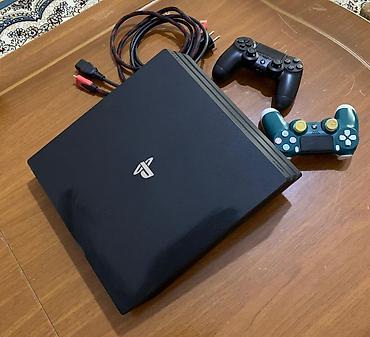 PS4 (Sony Playstation 4): Satılır: PS4 Pro 1TB 450 azn. Accountdakı oyunlar: GTA 5,Gran Turismo — 2