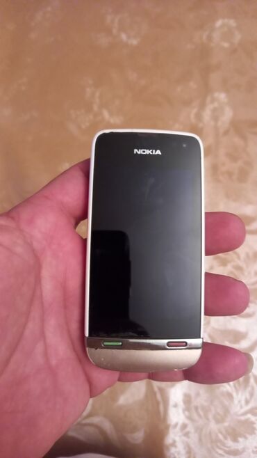 nokia adaptor: Nokia 311. Karobkası və adaptoru var. Əla işləyir. WAPSAP.GETMIR!