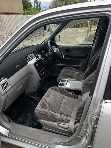 машина гибрид марки: Honda CR-V: 1999 г., 2 л, Автомат, Бензин, Кроссовер — 4