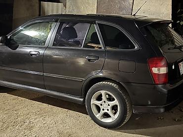 мустанг авто: Mazda 323: 2001 г., 2 л, Автомат, Газ, Универсал — 2