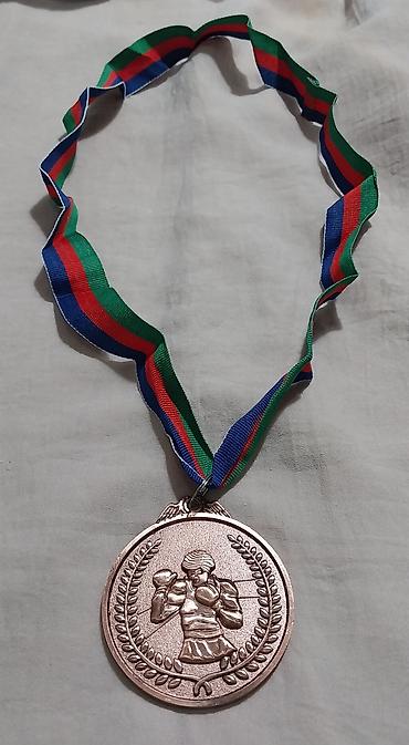 İdman kubokları və medalları: Boks medal dəsti - Rənglər: qızıl, gümüş, bürünc - Dizayn: Hər iki — 17