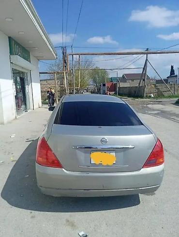 granta disk: Nissan Teana: 2.3 л | 2003 г. Седан — 3