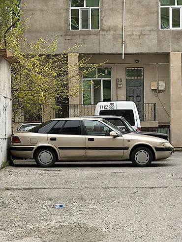 Opel: Model: daevoo Espero Rəng: qızılı/şampan Kuzov: 4 qapı, geniş salon — 4