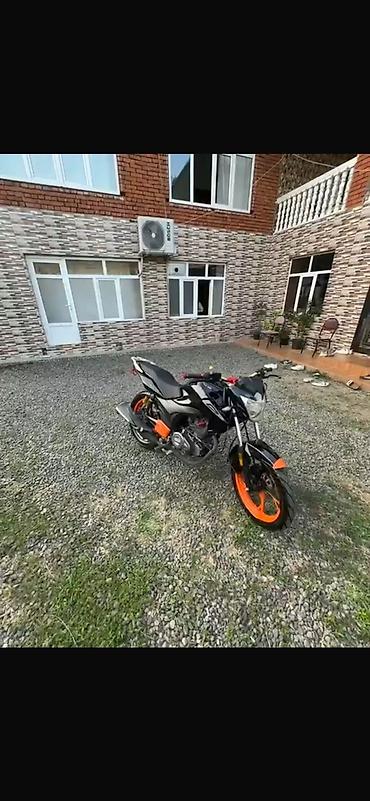 4 silindir motosiklet: Şəhər içi və qısa səfərlər üçün yığcam naked tipli motosiklet — 2