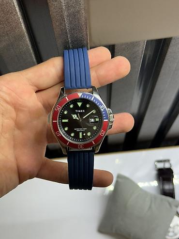 raketa saat: Timex dalğıc üslublu qol saatı - Model: Timex (üzlükdə və qapaqda — 2
