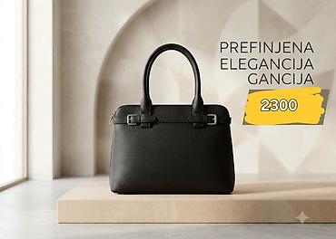 brener lidl: Elegantna crna ženska torba. - Klasičan trapezoidni dizajn sa — 1