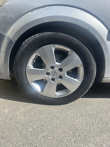 r16 michelin: Opel astra üçün orijinal 16 düymlük yüngül lehimli disk və şin — 1